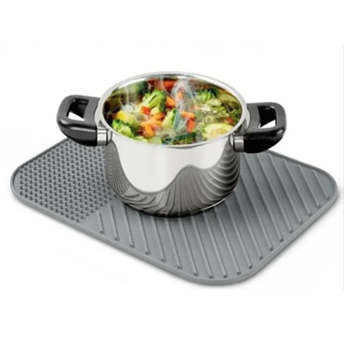 Alfombrilla de silicona resistente al calor para encimera de cocina.